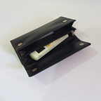 Black leather wallet for women with magnetic closure