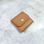 Foldable leather jewellery pouch made of natural cow leather, real leather mini jewelry organizer with four inner pockets and button closure, 2.5x2.5 inch travel case