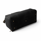 Black leather duffel bag with shoe compartment for travel and gym
