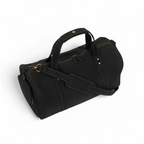 Black leather duffel bag with shoe compartment for travel and gym