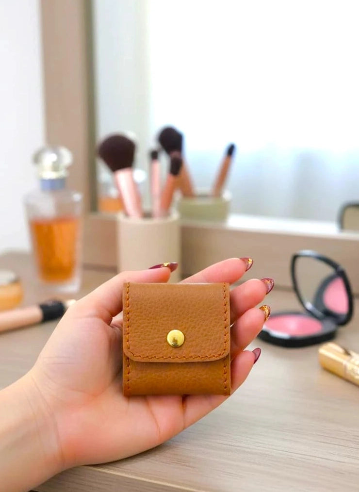 Foldable leather jewellery pouch made of natural cow leather, real leather mini jewelry organizer with four inner pockets and button closure, 2.5x2.5 inch travel case