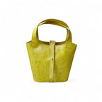 Leather bucket bag for women yellow structured mini handbag 8x10x4 Pakistan