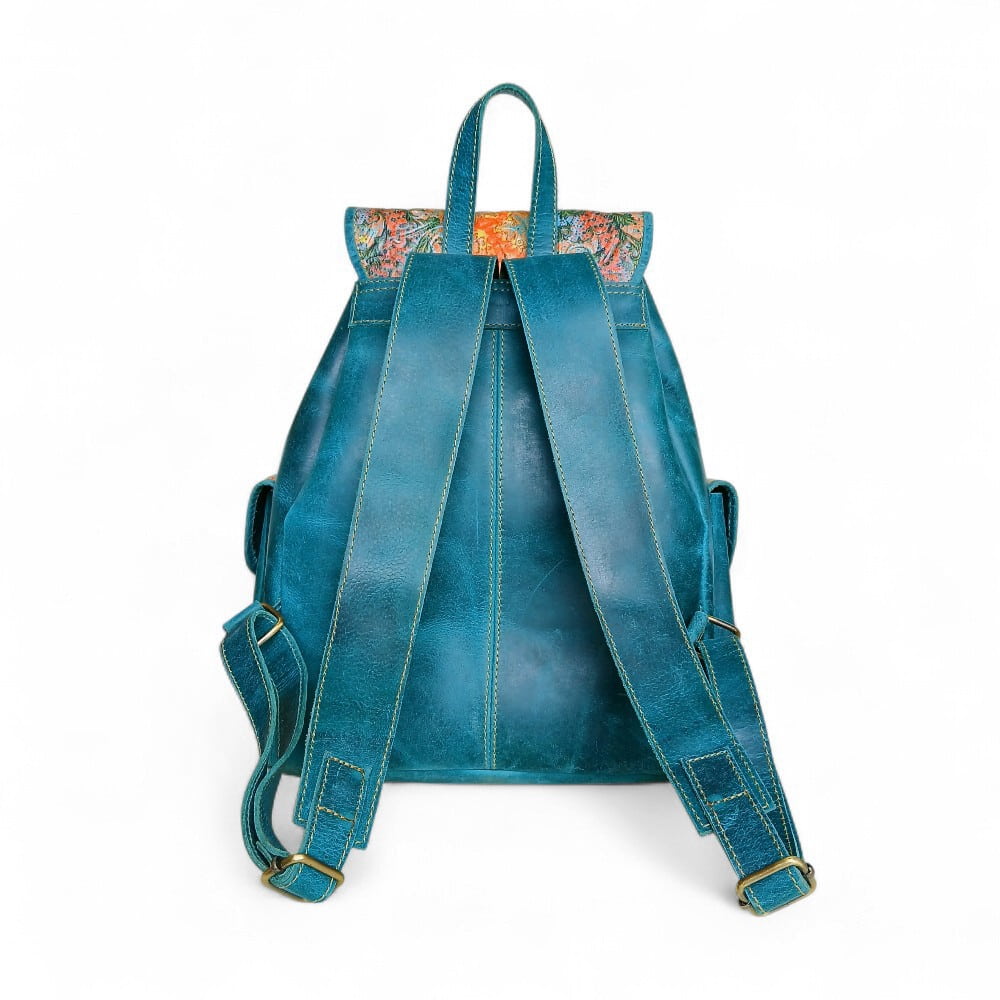 Antique gold brass buckle detail on teal leather women's backpack — genuine leather bag online Pakistan