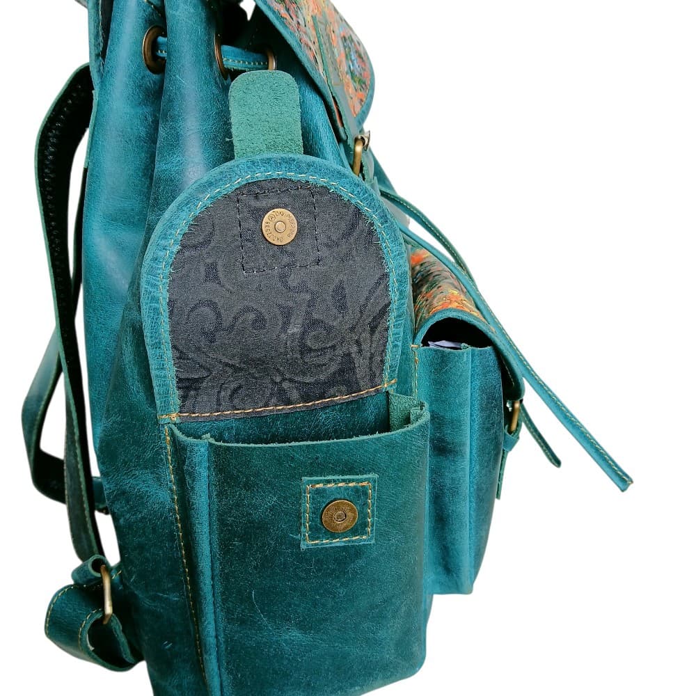 Multi-pocket teal leather backpack for women — two side pouches, front pocket, genuine leather Pakistan