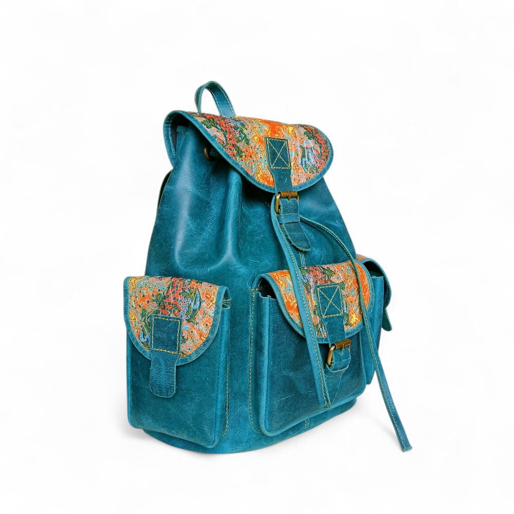 Women's teal genuine leather backpack with printed floral panels — boho vintage ladies bag Pakistan