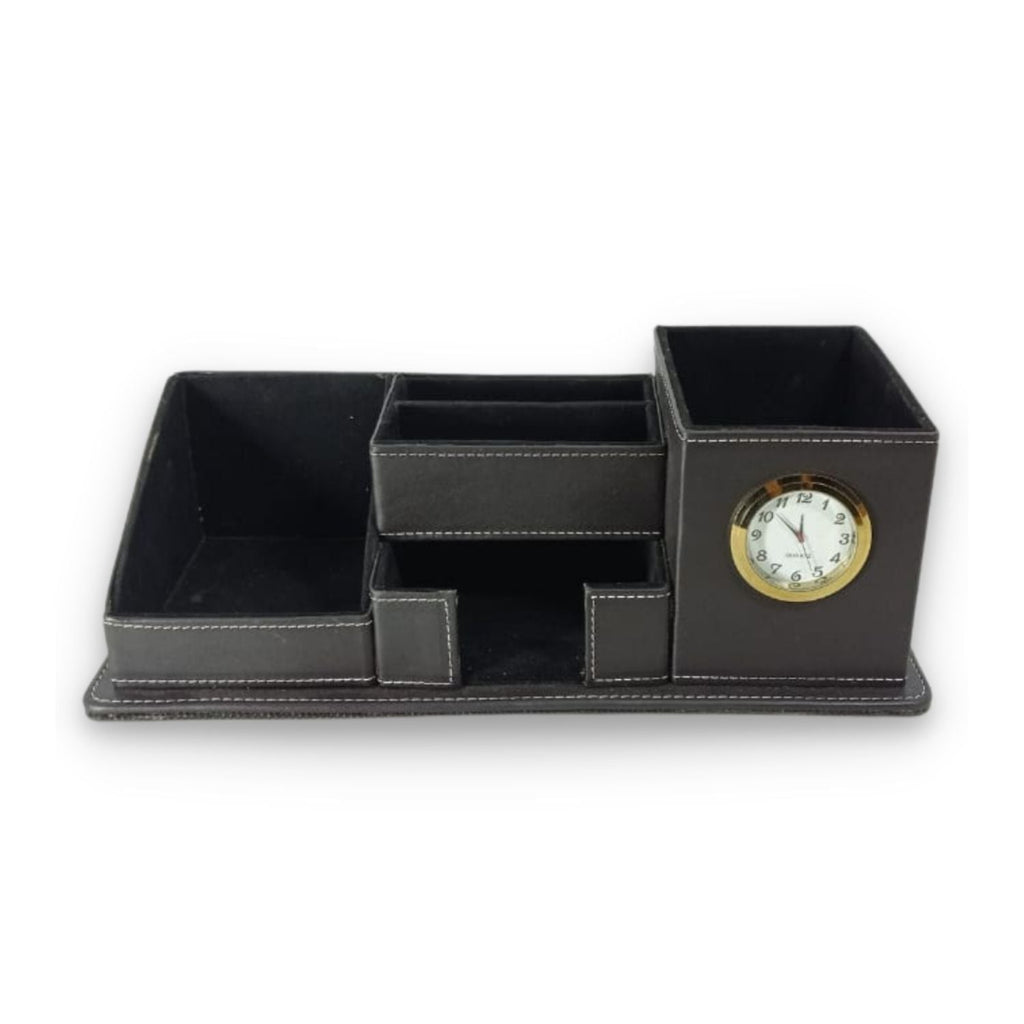 Black leather desk organizer with wood and suede compartments