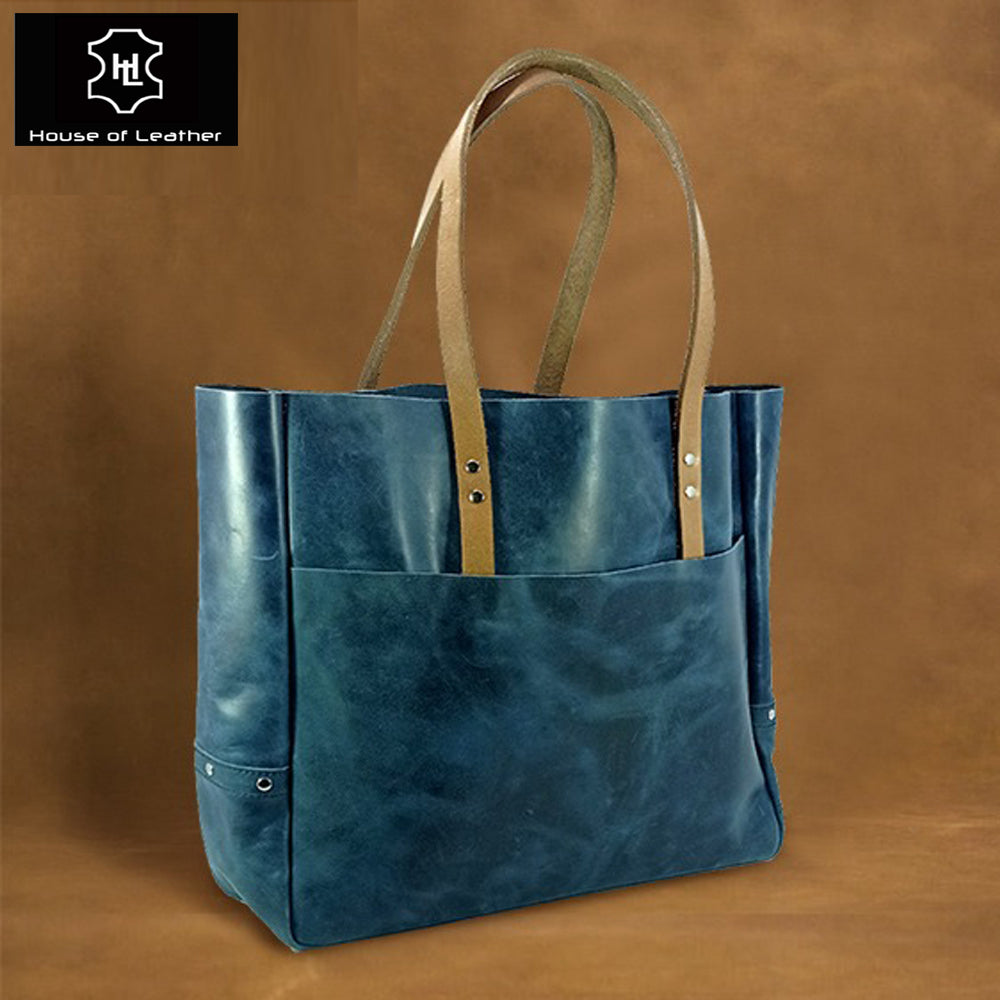 Large navy leather carryall tote for work and travel