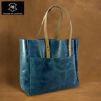 Large navy leather carryall tote for work and travel