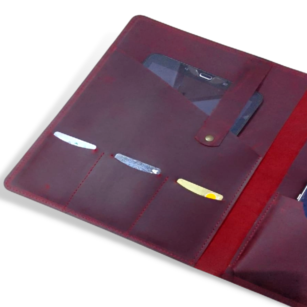 Maroon leather tech organizer with pen, credit card, and file compartments